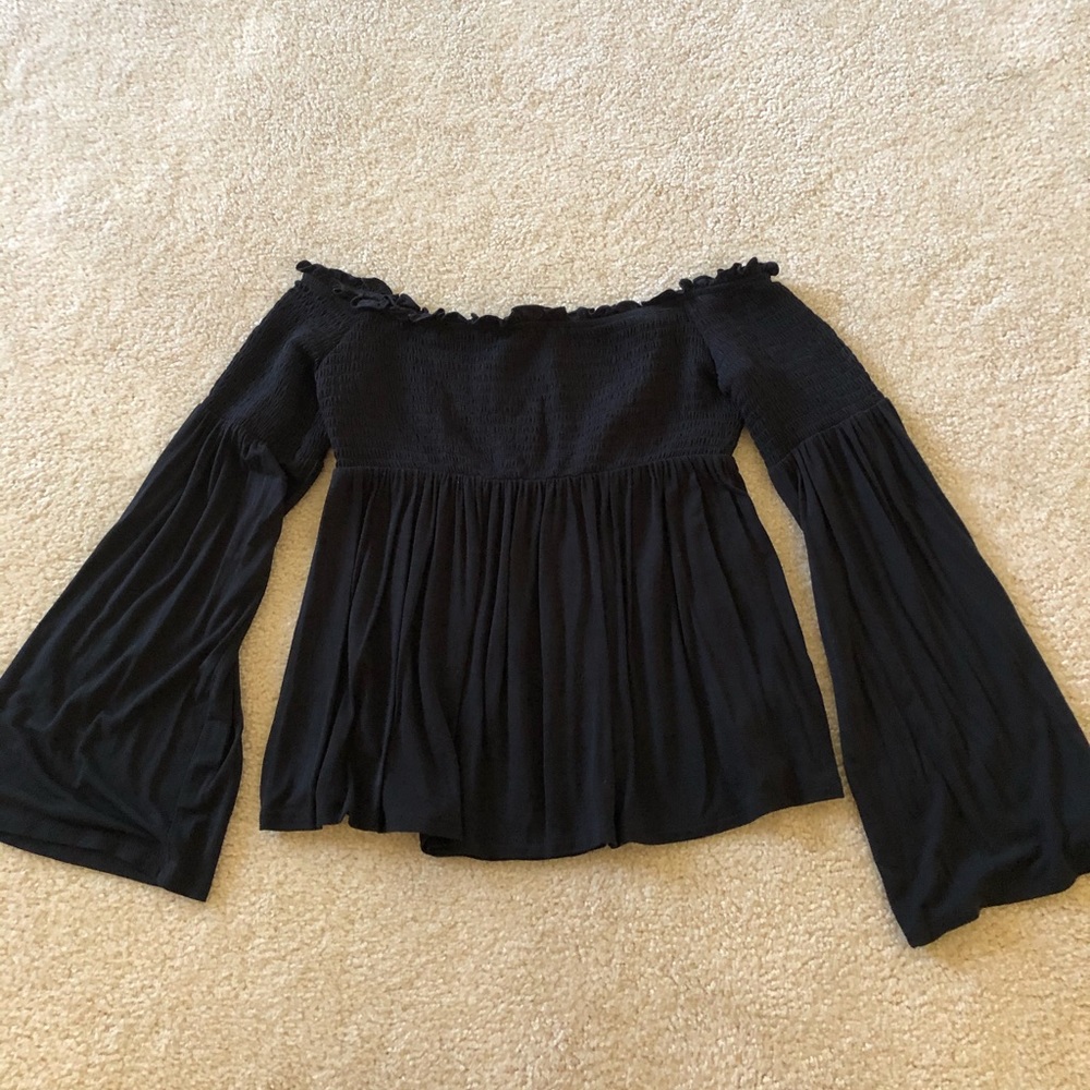 black flowy off the shoulder blouse